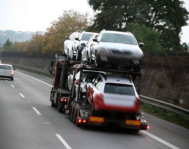 New Cars Transportation With Car Carrier On The Highway In Czech Republic,Europe